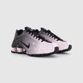 These are Nike Shox R4 sneakers in a metallic silver and black colorway
