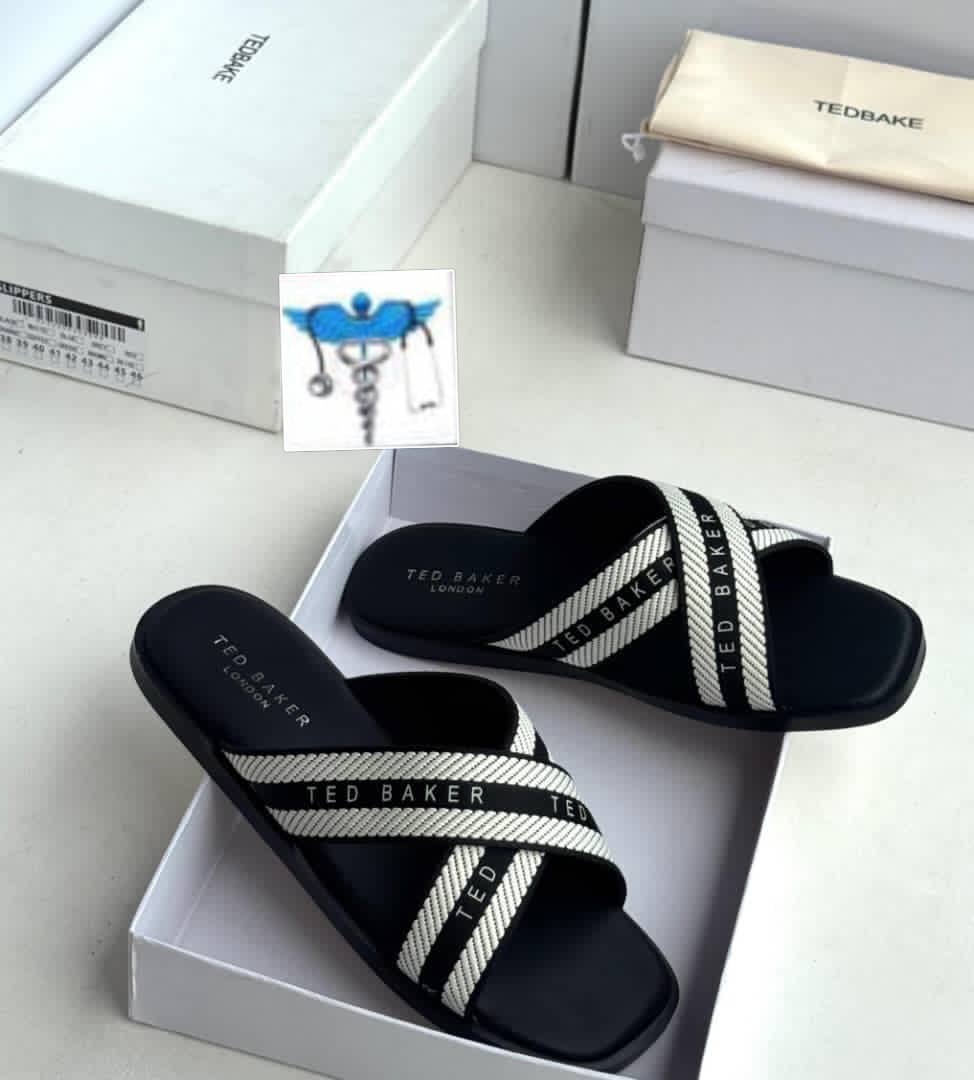 black and white Ted Baker Ashika webbing flat sandals