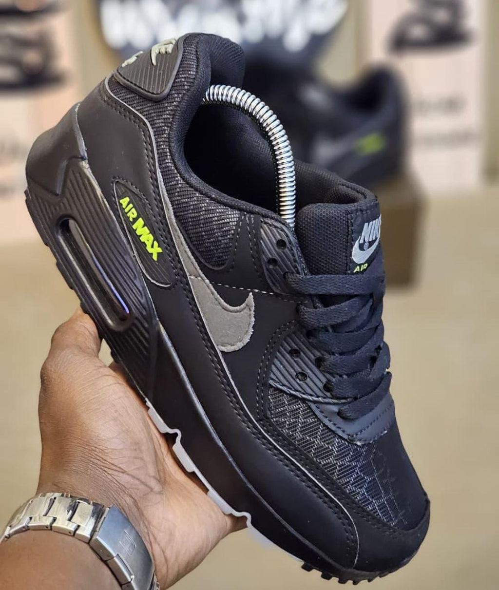 Nike Air Max 90 sneakers.